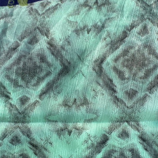 Stoffdetail: upcycelter Sari-Stoff in Mintgrün